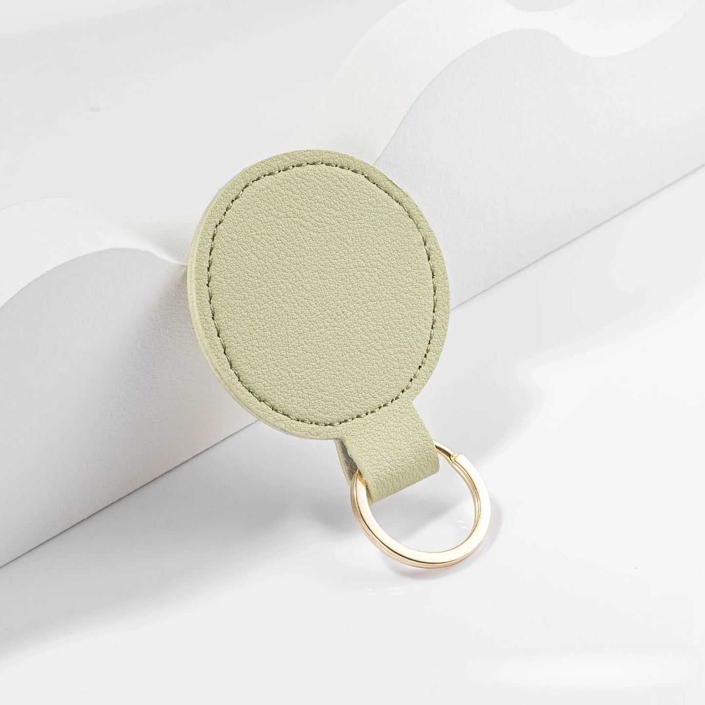 Personalisierter runder Schlüsselanhänger aus PU-Leder