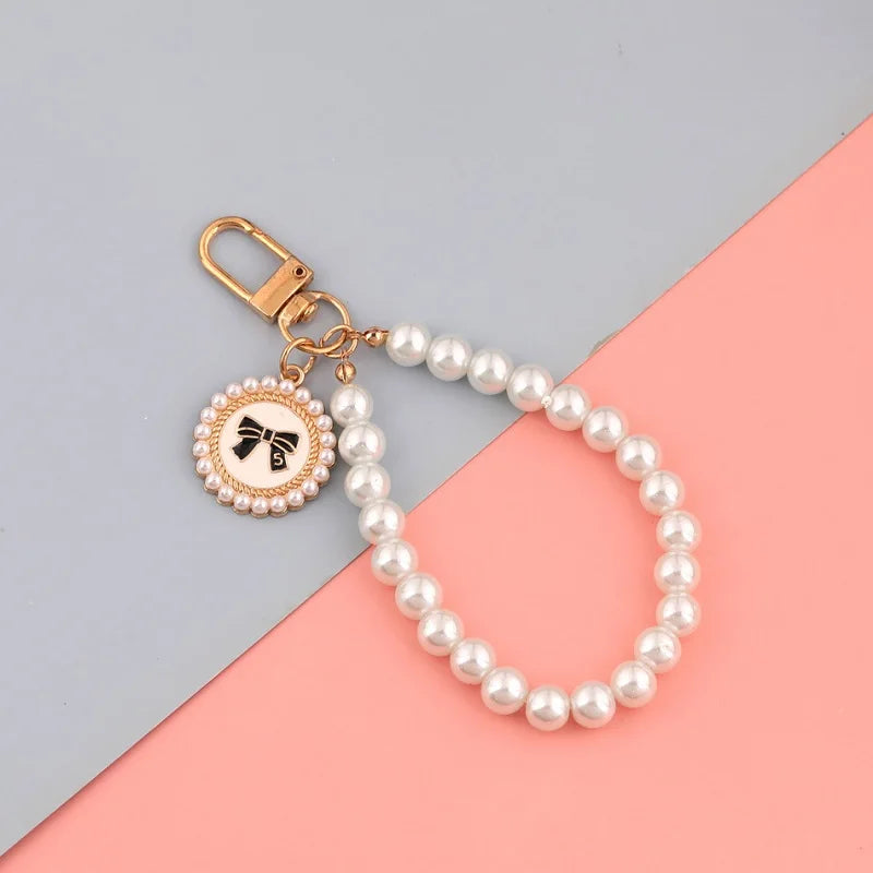 1PC Nette Shell Herz Bogen Imitation Perle Perlen Kette Anhänger Telefon Schlüsselbund Imitation Perle Tasche Schlüssel Kette