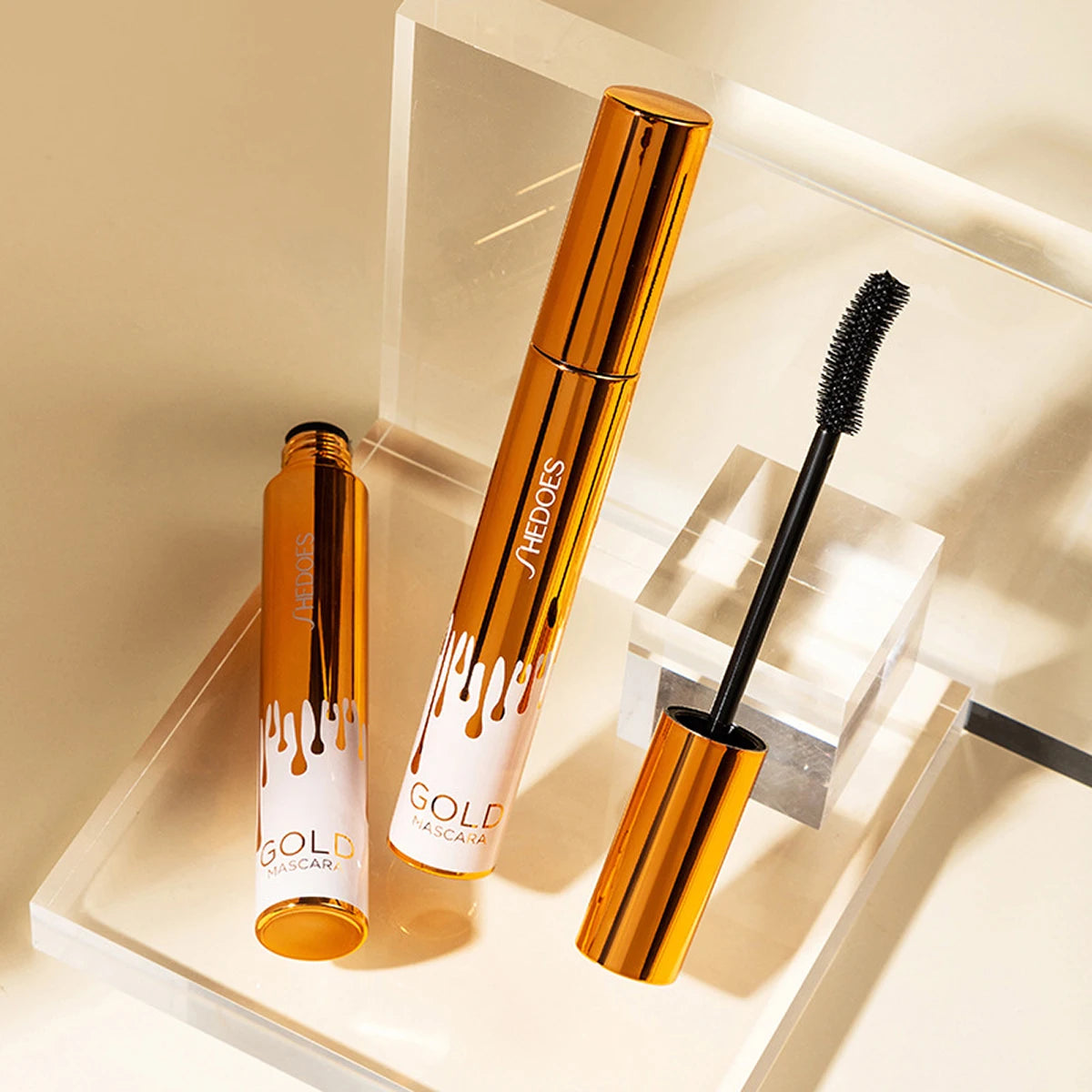 Dicke, lockige, schwarze, wasserfeste, nicht verschmierende, schlanke, langlebige und make-upfreie Augen-Mascara in schwarzer Goldfarbe