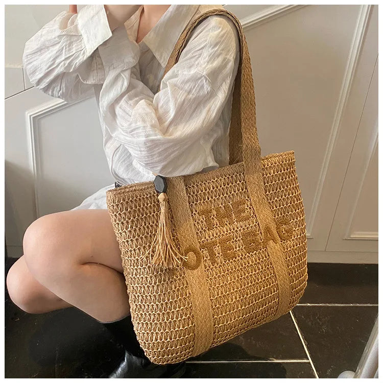 Französischer Stil, große Kapazität, gewebte Strohtasche für Damen, neue Strandurlaub-Umhängetasche, lässige Pendler-Einkaufstasche, Geldbörse