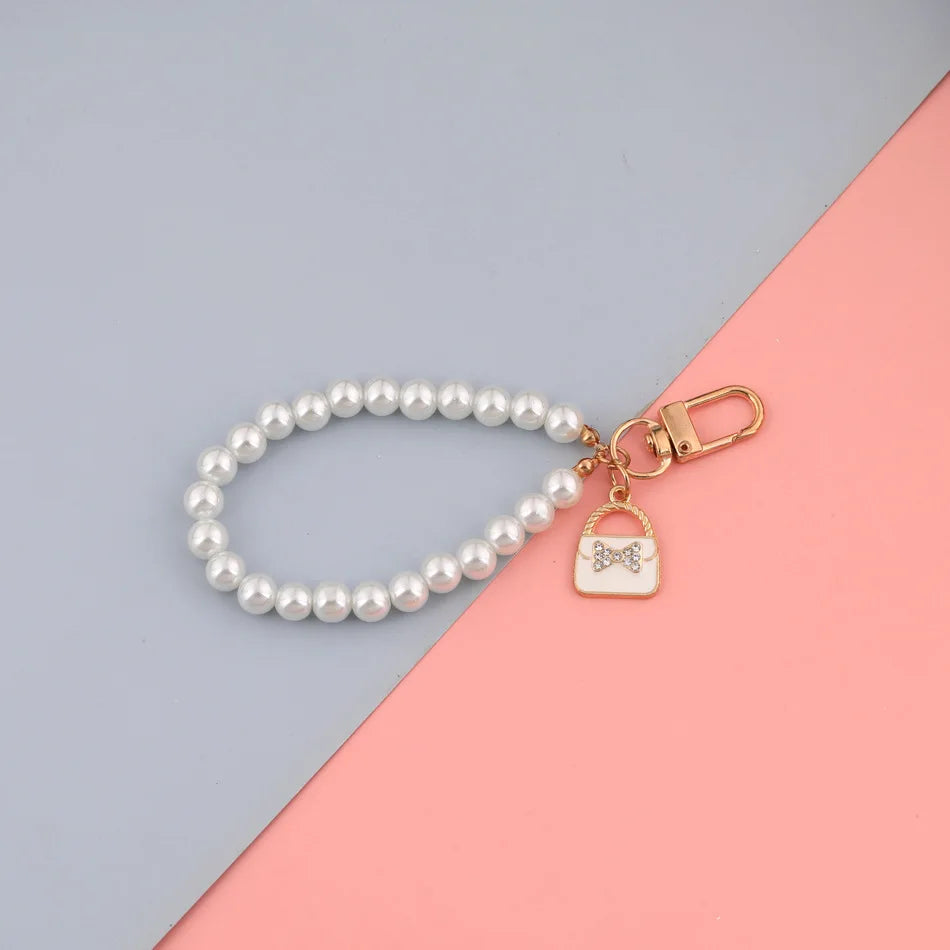 1PC Nette Shell Herz Bogen Imitation Perle Perlen Kette Anhänger Telefon Schlüsselbund Imitation Perle Tasche Schlüssel Kette