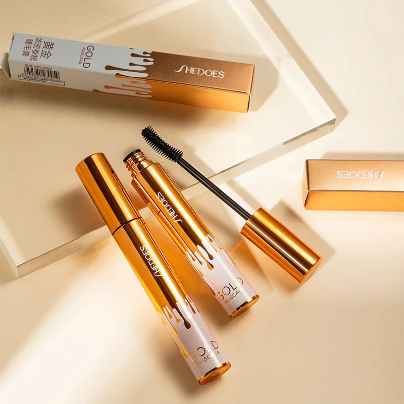 Dicke, lockige, schwarze, wasserfeste, nicht verschmierende, schlanke, langlebige und make-upfreie Augen-Mascara in schwarzer Goldfarbe