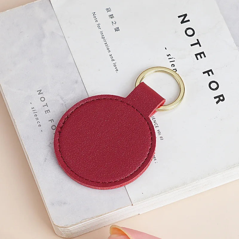 Personalisierter runder Schlüsselanhänger aus PU-Leder