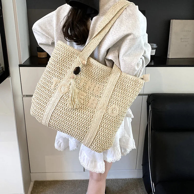 Französischer Stil, große Kapazität, gewebte Strohtasche für Damen, neue Strandurlaub-Umhängetasche, lässige Pendler-Einkaufstasche, Geldbörse