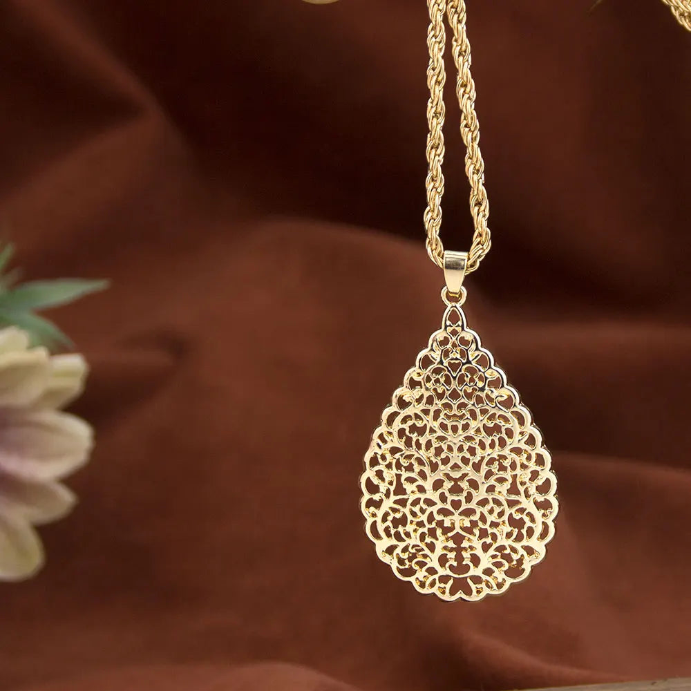 Sunspicems Goldfarbenes Arabisches Damen-Schmuckset Hohle Tropfenförmige Ohrringe Anhänger Halskette Marokkanischer Brautschmuck Strand-Schmuck