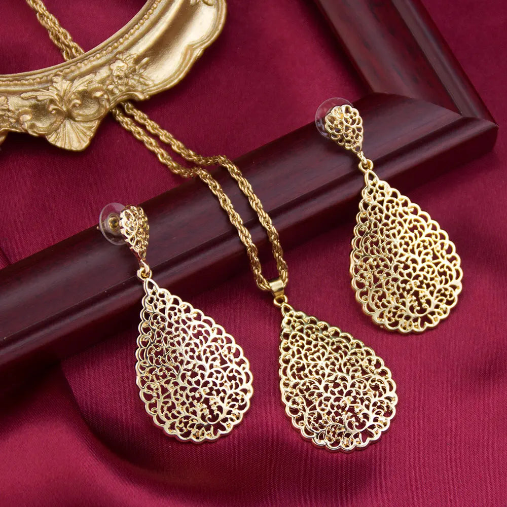 Sunspicems Goldfarbenes Arabisches Damen-Schmuckset Hohle Tropfenförmige Ohrringe Anhänger Halskette Marokkanischer Brautschmuck Strand-Schmuck