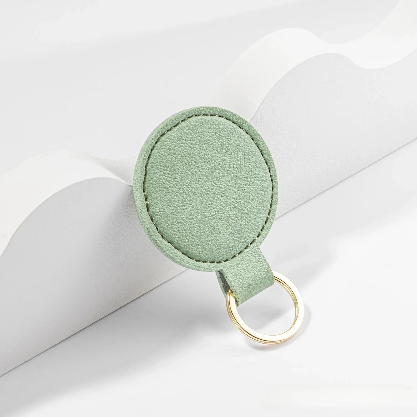 Personalisierter runder Schlüsselanhänger aus PU-Leder