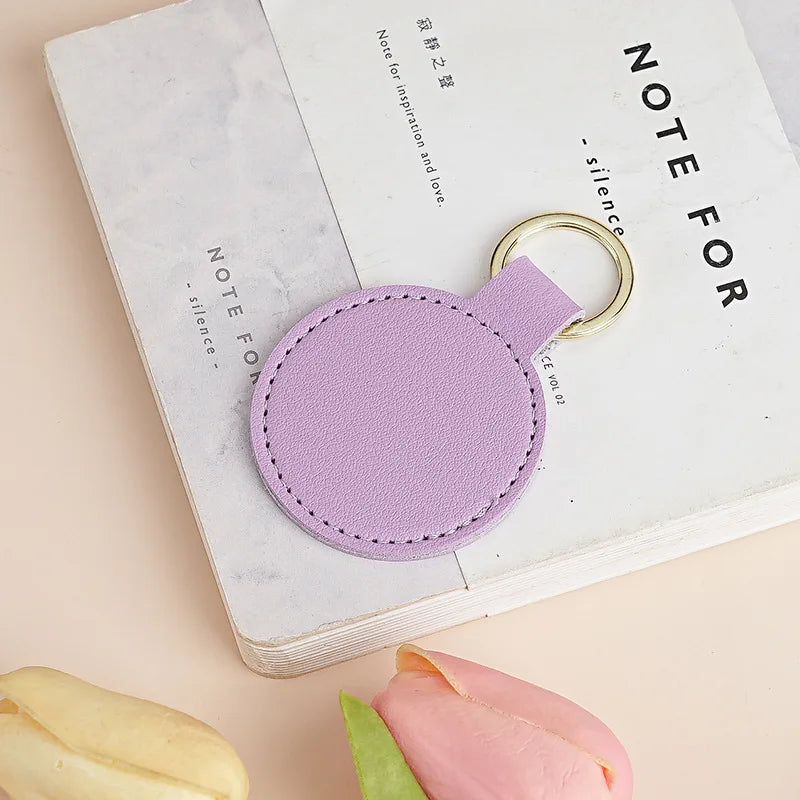 Personalisierter runder Schlüsselanhänger aus PU-Leder